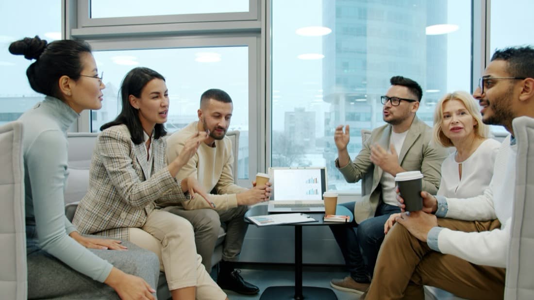 A small group chatting over coffee